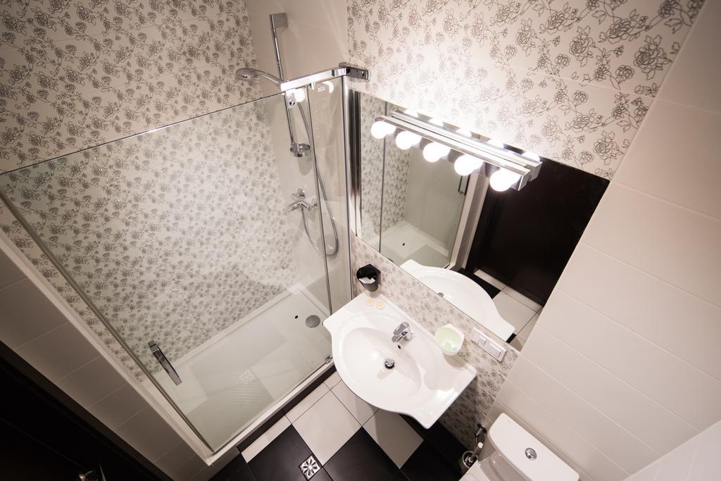 Central Hotel Lviv Ruang foto